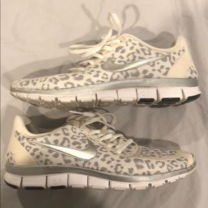 Women’s size 12 (run like 11) Nike Leopard tennies